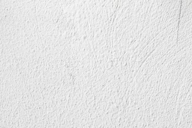 Arka plan doku. Beyaz beton duvar. Yüzeyi küçük çatlaklar.