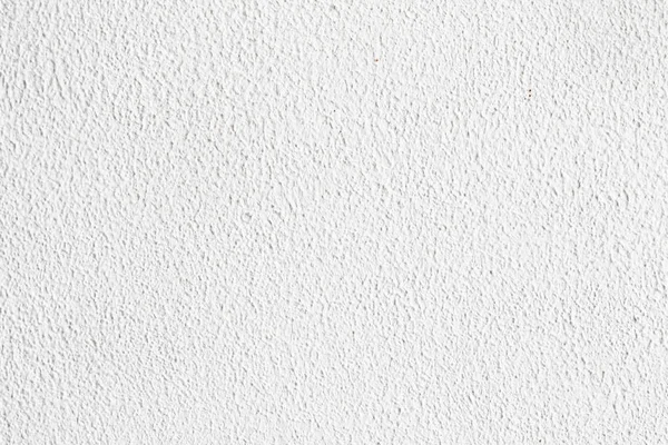 背景のテクスチャです 白いコンクリートの壁 表面に小さな亀裂 — ストック写真