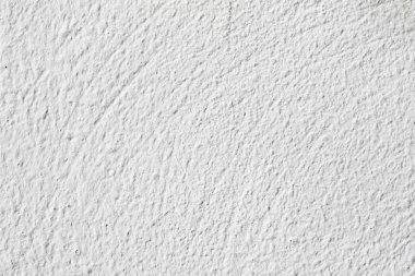 Arka plan doku. Beyaz beton duvar. Yüzeyi küçük çatlaklar.