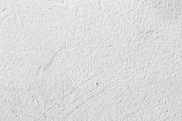 Arka plan doku. Beyaz beton duvar. Yüzeyi küçük çatlaklar.