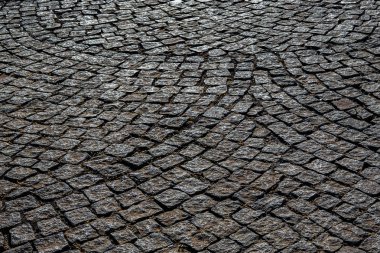 Cobblestones pattern viewed from above as a full frame texture, background. clipart