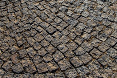 Yukarıdan bir tam kare doku arka plan olarak izlendi cobblestones desen.
