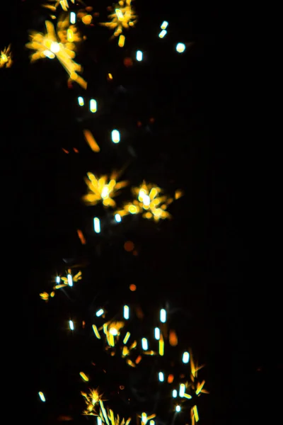 Défocalisé Étincelles Feu Sur Fond Noir Bokeh Lumineux Fond Flou — Photo