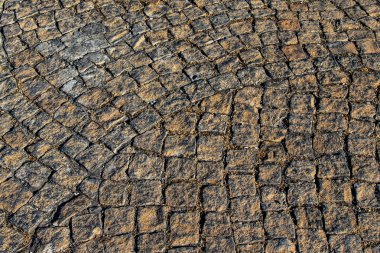 Yukarıdan bir tam kare doku arka plan olarak izlendi cobblestones desen.