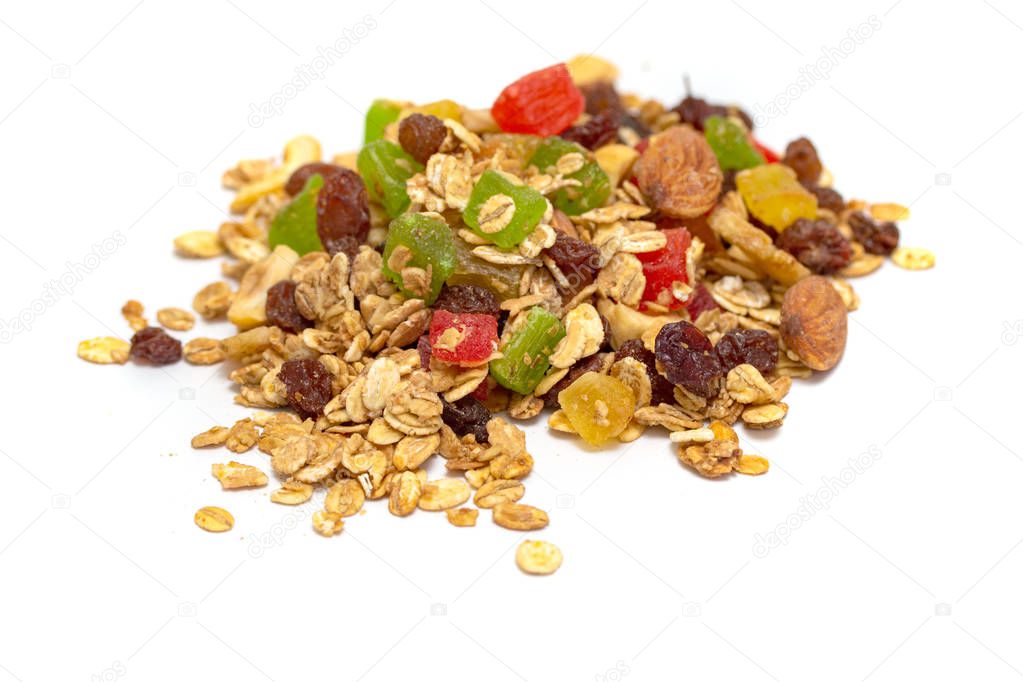 Granola, a breakfast dish containing rolled oats, nuts and honey, baked to a crispy state. On a white background.