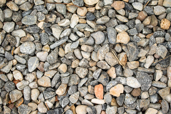 Round sea pebbles background.