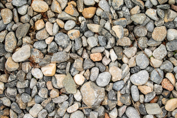 Round sea pebbles background.