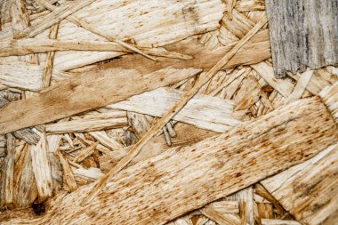 Ahşap yonga dokusu arka planından yapılmış tahta panel.