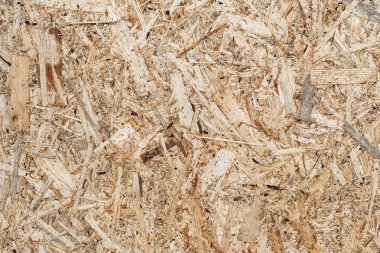 Ahşap yonga dokusu arka planından yapılmış tahta panel.