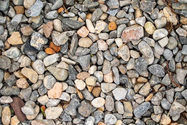 Round sea pebbles background.