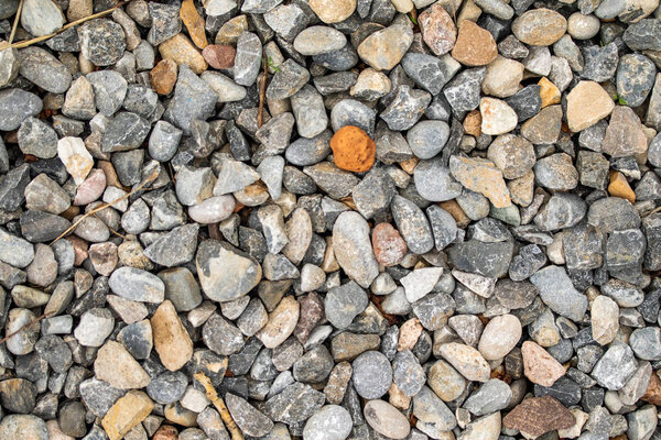 Round sea pebbles background.