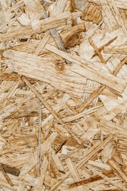 Ahşap yonga dokusu arka planından yapılmış tahta panel.