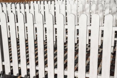 White wooden fence rails.