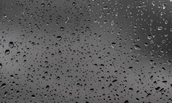Dešťové Kapky Skleněné Chmurné Šedé Pozadí Dešťové Šedé Textura Skla — Stock fotografie