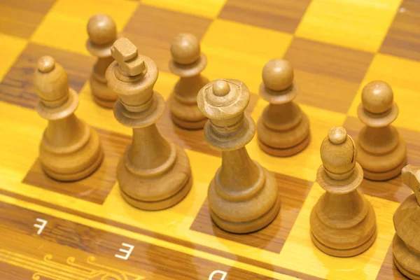 Chess pieces on a chessboard, wooden pieces. — Stock Photo, Image