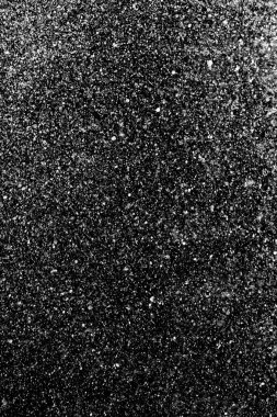 Su sıçramaları, beyaz bokeh, karanlık bir arka planda odak dışında bulanık arka plan.