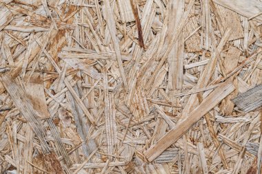 Ahşap yonga dokusu arka planından yapılmış tahta panel.