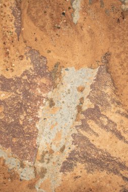 Arka plan olarak kırmızı granit taş duvar