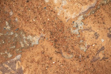 Arka plan olarak kırmızı granit taş duvar