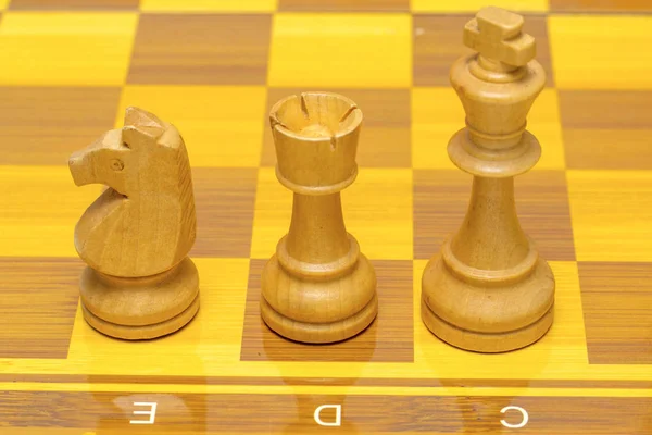 Chess pieces on a chessboard, wooden pieces. — Stock Photo, Image