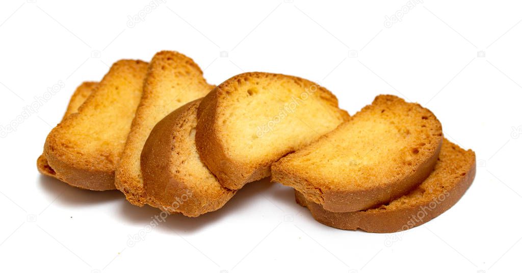 Roasted croutons, rye crackers on a white background.