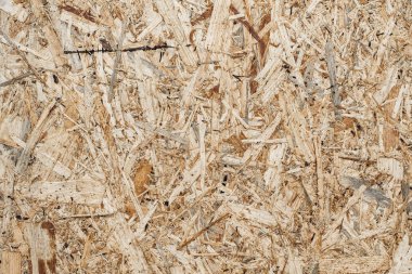 Ahşap yonga dokusu arka planından yapılmış tahta panel.