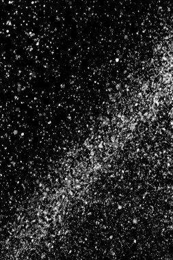 Su sıçramaları, beyaz bokeh, karanlık bir arka planda odak dışında bulanık arka plan.