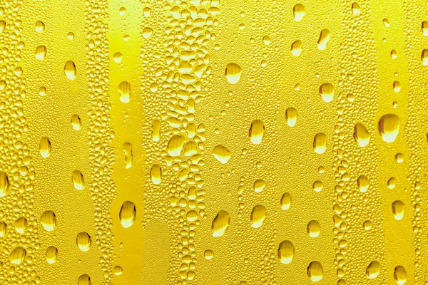 Drops Water Glass Yellow Background Beer Misted Background — Stock Photo, Image