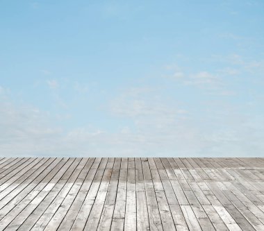 bulutlu gökyüzü karşı ahşap zemin