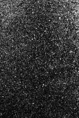 Su sıçramaları, beyaz bokeh, karanlık bir arka planda odak dışında bulanık arka plan.