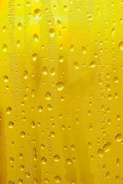 Drops Water Glass Yellow Background Beer Misted Background — Stock Photo, Image