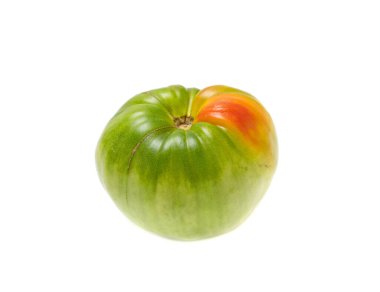 Beyaz arka planda kırmızı noktalı yeşil domates..