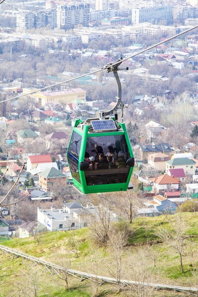 ALMATY, KAZAKHSTAN -  29, 2019: Almaty city view from Kok Tobe hill and cabin of cable car, landmark in Almaty