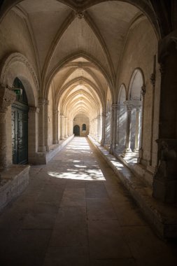 Romanesque Cloisters Church of Saint Trophime Cathedral in Arles. Provence,  France clipart