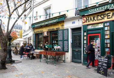 Paris, France - November 2017: Facade of the Shakespeare and company bookshop, store in Paris, France. clipart