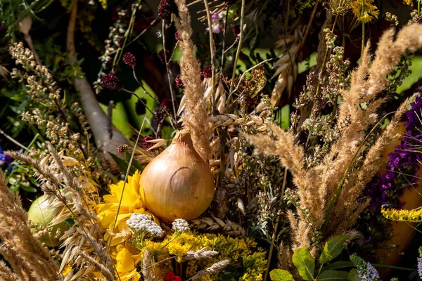 Floristic bouquet of flowers, herbs and fruits that are the symbol of summer