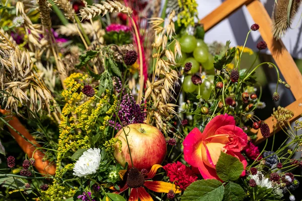 Floristic bouquet of flowers, herbs and fruits that are the symbol of summer