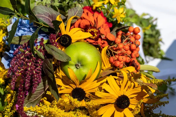 Floristic bouquet of flowers, herbs and fruits that are the symbol of summer