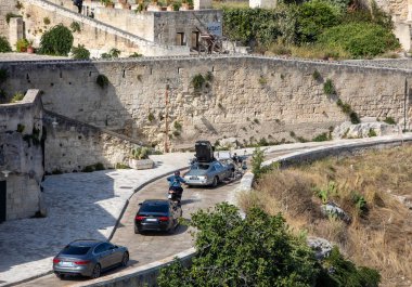 Matera, Italy - September 15, 2019: Bond 25, Aston Martin DB5 while filming chase scenes through the narrow streets of the movie 