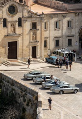 Matera, Italy - September 15, 2019: Bond 25, Aston Martin DB5 cars prepared to shoot chase scenes from the movie 