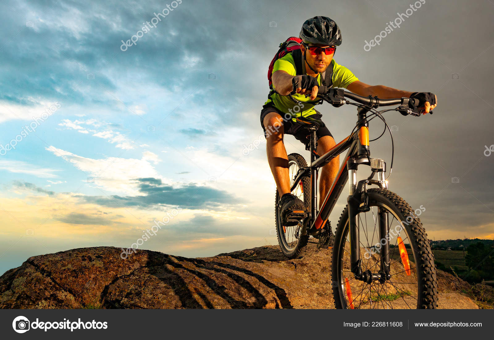 Cyclist Riding the Bike on Rocky Trail at Extreme Sport
