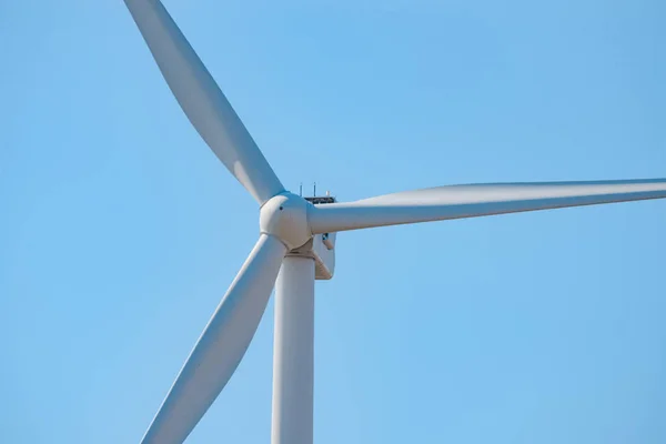 Wind Generator Turbine on the Blue Sky Bacground. Green Renewable Energy Concept. — Stock Photo, Image