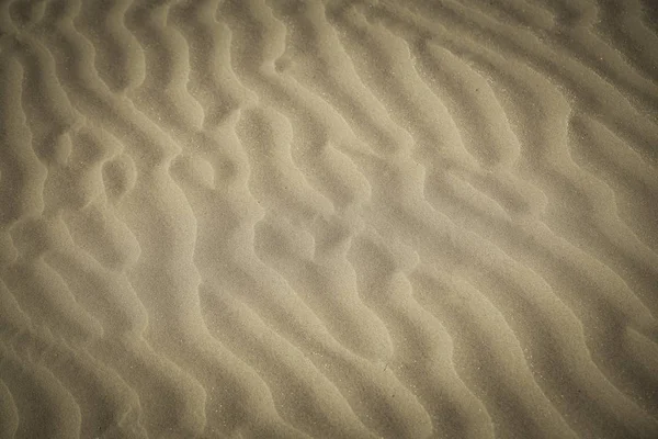 Areia no fundo da praia — Fotografia de Stock