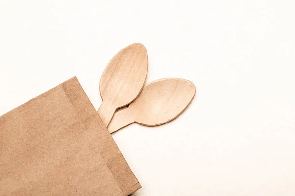 Eco-friendly disposable utensils made of bamboo wood and paper Wooden spoon