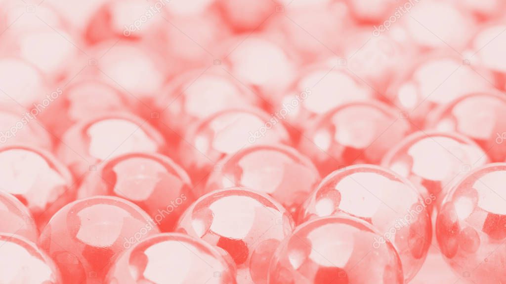 Transparent balls. Abstraction. Live coral color.