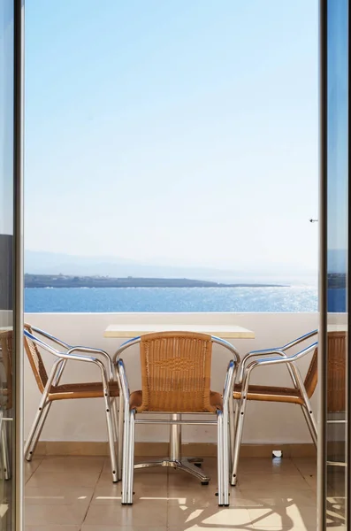 chair at balcony with sea view - rete, Greece