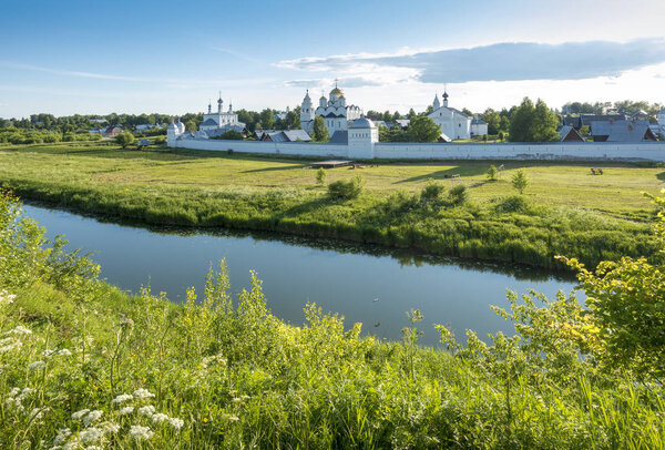 View of the Pokrovsky Monastery standing on the Kamenka river in Suzdal, which is part of the Golden ring of Russia