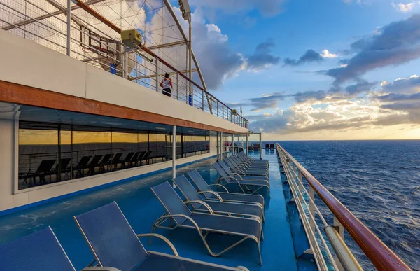 Deck of the passenger liner lit by the sunrise — Stock Photo, Image