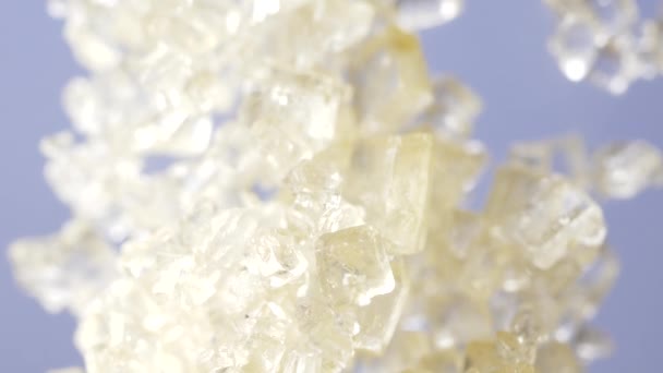 スローモーションで移動砂糖の結晶のマクロ撮影 — ストック動画
