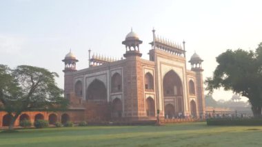 AGRA, INDIA - NOV 2018 : TOURISTS AND LOCALS MOVING NEAR TAJ MAHAL 